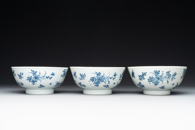 Six Chinese blue and white 'floral' bowls, a pair of dishes, a saucer and an iron-red-decorated plate, Qianlong