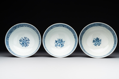 Six Chinese blue and white 'floral' bowls, a pair of dishes, a saucer and an iron-red-decorated plate, Qianlong