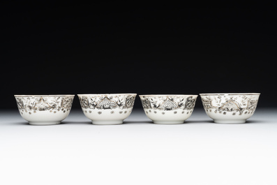 Four Chinese grisaille cups and saucers and a plate with blue-enamelled border, Qianlong