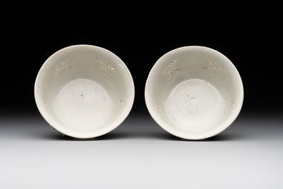 A pair of rare Chinese reticulated white-glazed biscuit 'Eight Immortals and Shoulao' bowls, Wanli