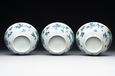 Six Chinese blue and white 'floral' bowls, a pair of dishes, a saucer and an iron-red-decorated plate, Qianlong