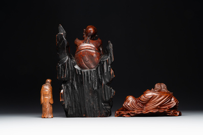 Two Chinese boxwood sculptures of Luohan and Liuhai and a bamboo sculpture of a sage, 17/19th C.