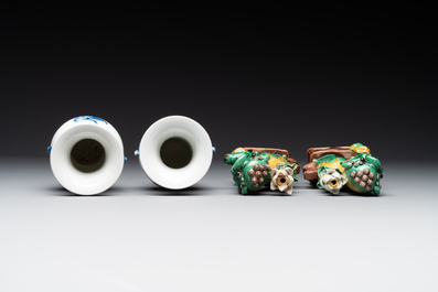 A pair of Chinese blue and white vases, a pair of sancai Buddhist lions, a famille rose ewer and a teapot, 19th C.