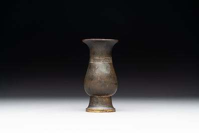 A rare Chinese parcel-gilt bronze ritual wine vessel, 'zhi 觯', Ming