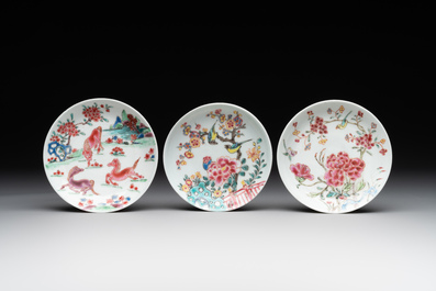 Five Chinese famille rose cups and saucers with horses, birds and flowers, Yongzheng/Qianlong