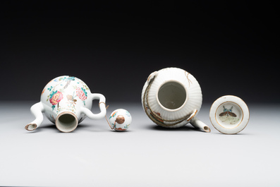 A pair of Chinese blue and white vases, a pair of sancai Buddhist lions, a famille rose ewer and a teapot, 19th C.