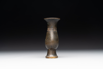 A rare Chinese parcel-gilt bronze ritual wine vessel, 'zhi 觯', Ming
