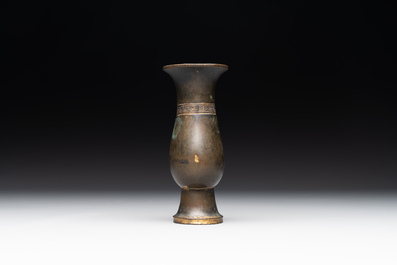 A rare Chinese parcel-gilt bronze ritual wine vessel, 'zhi 觯', Ming
