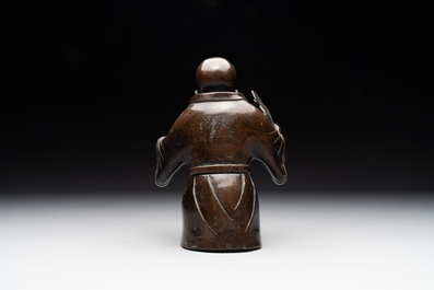 A Chinese bronze vase and a Taoist figure-shaped incense burner, Ming
