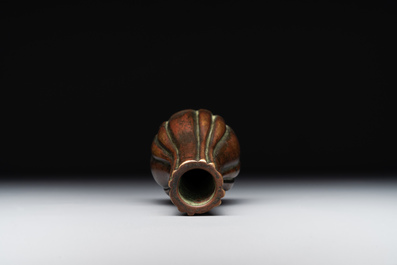 A rare Chinese ribbed bronze flower arranging vase, Ming