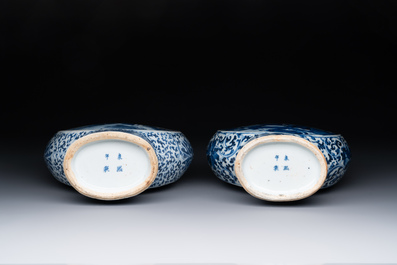 A pair of Chinese blue and white moonflasks or 'bianhu', Kangxi mark, 19th C.