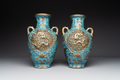 A pair of Chinese robin's egg and faux bronze-glazed 'hu' vases, Qianlong mark, 19th C.