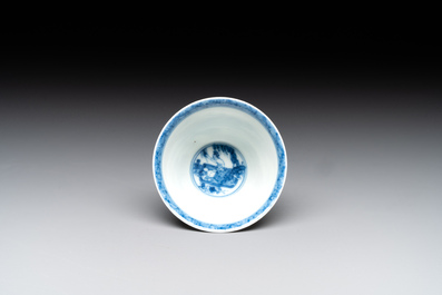 A Chinese blue and white 'erotic' cup and saucer, Kangxi