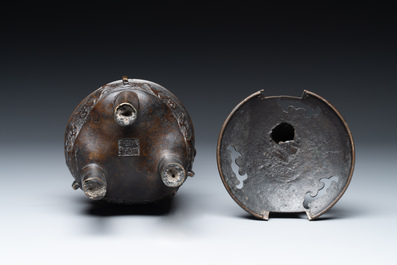 A fine Chinese bronze censer and cover with a Buddhist lion, 'ding 鼎', Xuande Mark, Ming