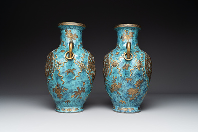 A pair of Chinese robin's egg and faux bronze-glazed 'hu' vases, Qianlong mark, 19th C.