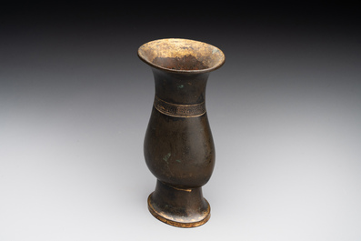 A rare Chinese parcel-gilt bronze ritual wine vessel, 'zhi 觯', Ming