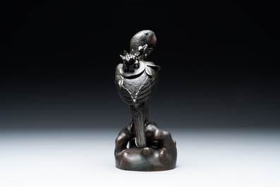 A rare Chinese bronze 'parrot' incense burner, Ming