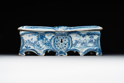 A rare blue and white Dutch Delft jewellery casket and cover, 18th C.