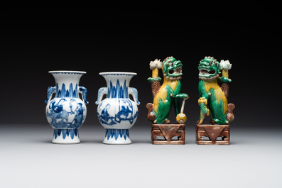 A pair of Chinese blue and white vases, a pair of sancai Buddhist lions, a famille rose ewer and a teapot, 19th C.