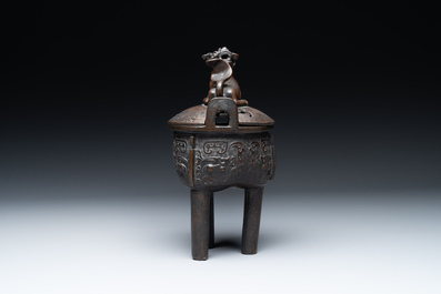 A fine Chinese bronze censer and cover with a Buddhist lion, 'ding 鼎', Xuande Mark, Ming
