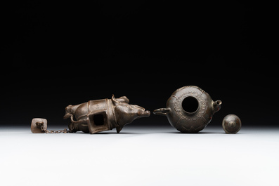 A pair of Chinese bronze mythical creatures and two ewers, Ming