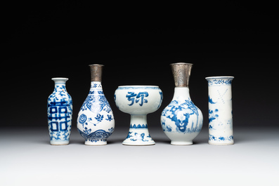 Four Chinese blue and white vases and a stem cup, Kangxi and later