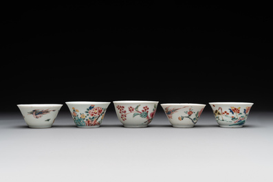 Five Chinese famille rose cups and saucers with horses, birds and flowers, Yongzheng/Qianlong