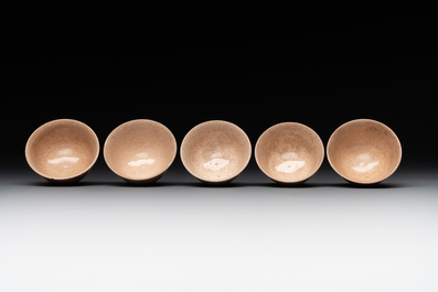 A Japanese blue and white gourd vase, an Imari bottle vase and a set of five Satsuma cups, 19th C.