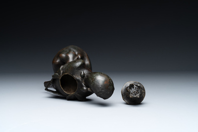 A rare Chinese bronze 'parrot' incense burner, Ming