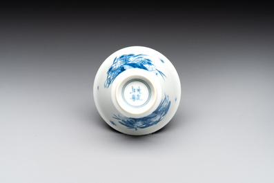 A Chinese blue and white 'erotic' cup and saucer, Kangxi