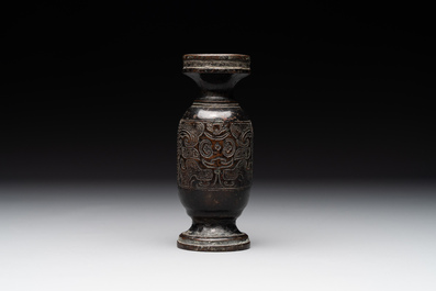 A Chinese bronze vase and a Taoist figure-shaped incense burner, Ming
