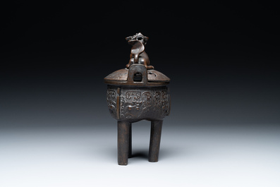 A fine Chinese bronze censer and cover with a Buddhist lion, 'ding 鼎', Xuande Mark, Ming