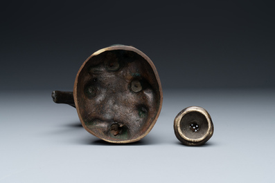 A rare Chinese bronze 'parrot' incense burner, Ming