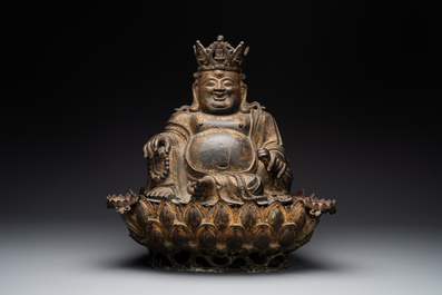 An important and large Chinese gilt bronze Buddha on a lotus throne, Ming
