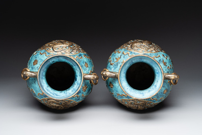A pair of Chinese robin's egg and faux bronze-glazed 'hu' vases, Qianlong mark, 19th C.