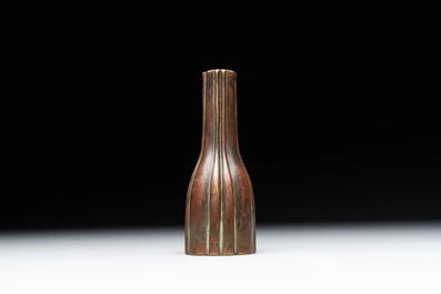 A rare Chinese ribbed bronze flower arranging vase, Ming