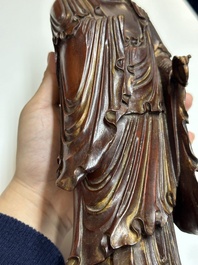 A Chinese partly gilt and lacquered wooden sculpture of Guanyin, Ming