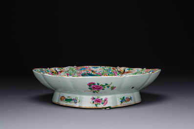 Two Chinese Canton famille rose dishes and a tazza, 19th C.