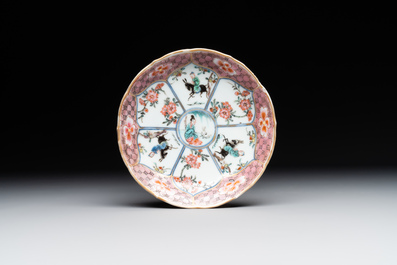 A Chinese famille rose cup and saucer with figures and animals, Yongzheng