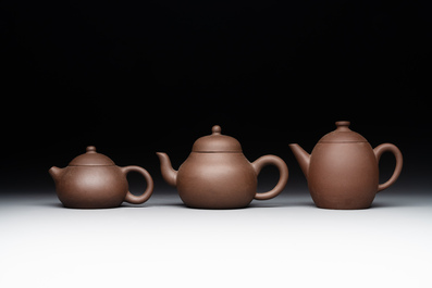 A collection of 20 Chinese Yixing stoneware teapots, 20th C.