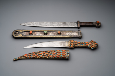 A varied collection of four decorated daggers, two inset with red coral and turquoise, Sri Lanka and Georgia, 18/19th C.