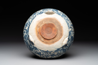 A Chinese Swatow blue and white crackle-glazed 'peonies and trigrams' tripod censer, Ming
