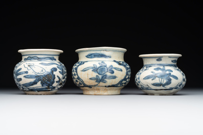 A varied collection of 22 Chinese blue and white jarlets, covered boxes and miniature vases, Ming