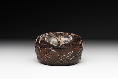 A Chinese huanghuali wooden box and cover with pomegranate design, 17/18th C.