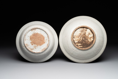 Two Chinese Swatow red-, turquoise- and black-enamelled 'phoenixes' and 'river landscape' dishes, Ming