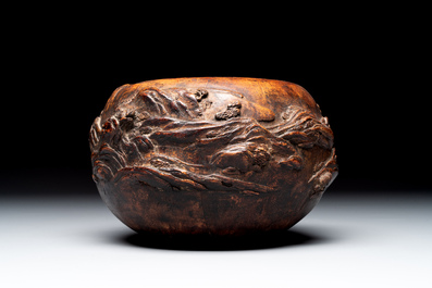 A Chinese agarwood brush washer with landscape relief design on wooden stand, 17/18th C.