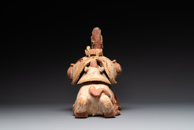 A pair of Chinese polychrome-painted terracotta camels with saddles, Tang