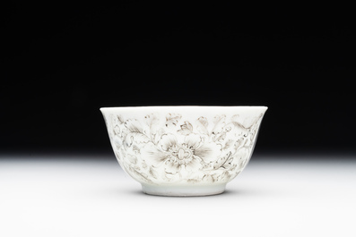 A rare Chinese grisaille and gilt cup and saucer with Ignatius of Loyola, Qianlong