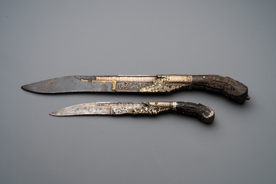 A varied collection of four decorated daggers, two inset with red coral and turquoise, Sri Lanka and Georgia, 18/19th C.