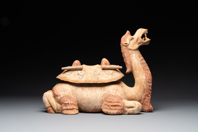 A pair of Chinese polychrome-painted terracotta camels with saddles, Tang